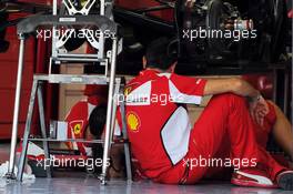 Ferrari F2012 is prepared by mechanics in the pits. 01.11.2012. Formula 1 World Championship, Rd 18, Abu Dhabi Grand Prix, Yas Marina Circuit, Abu Dhabi, Preparation Day.