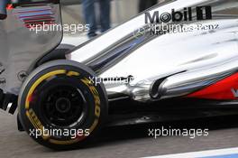 McLaren MP4/27 exhaust detail. 06.11.2012. Formula 1 Young Drivers Test, Day 1, Yas Marina Circuit, Abu Dhabi, UAE.