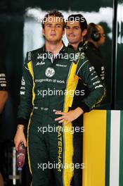 Giedo van der Garde (NED) Caterham Third Driver with Alexander Rossi (USA) Caterham F1 Test Driver behind. 07.11.2012. Formula 1 Young Drivers Test, Day 2, Yas Marina Circuit, Abu Dhabi, UAE.