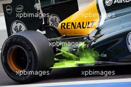 Caterham CT01 flow-vis paint on the rear suspension and exhaust. 07.11.2012. Formula 1 Young Drivers Test, Day 2, Yas Marina Circuit, Abu Dhabi, UAE.