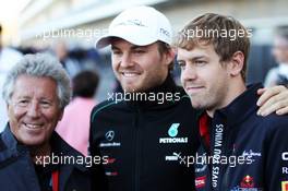 (L to R): Mario Andretti (USA) with Nico Rosberg (GER) Mercedes AMG F1 and Sebastian Vettel (GER) Red Bull Racing. 16.11.2012. Formula 1 World Championship, Rd 19, United States Grand Prix, Austin, Texas, USA, Practice Day.