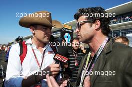 Will Buxton (GBR) Speed TV Presenter with Patrick Dempsey (USA) Actor on the grid. 18.11.2012. Formula 1 World Championship, Rd 19, United States Grand Prix, Austin, Texas, USA, Race Day.