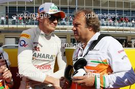 (L to R): Nico Hulkenberg (GER) Sahara Force India F1 with Robert Fearnley (GBR) Sahara Force India F1 Team Deputy Team Principal on the grid. 18.11.2012. Formula 1 World Championship, Rd 19, United States Grand Prix, Austin, Texas, USA, Race Day.