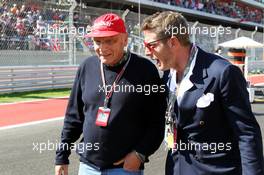 Niki Lauda (AUT) Mercedes Non-Executive Chairman with Lapo Elkann (USA). 18.11.2012. Formula 1 World Championship, Rd 19, United States Grand Prix, Austin, Texas, USA, Race Day.