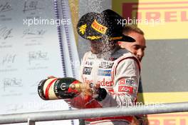 Race winner Lewis Hamilton (GBR) McLaren celebrates on the podium. 18.11.2012. Formula 1 World Championship, Rd 19, United States Grand Prix, Austin, Texas, USA, Race Day.