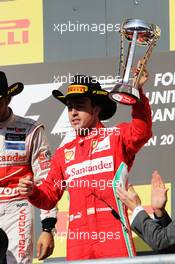 Fernando Alonso (ESP) Ferrari celebrates his third position on the podium. 18.11.2012. Formula 1 World Championship, Rd 19, United States Grand Prix, Austin, Texas, USA, Race Day.
