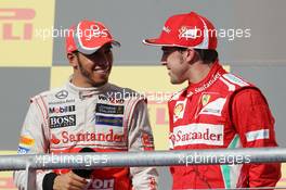 (L to R): race winner Lewis Hamilton (GBR) McLaren with Fernando Alonso (ESP) Ferrari on the podium. 18.11.2012. Formula 1 World Championship, Rd 19, United States Grand Prix, Austin, Texas, USA, Race Day.