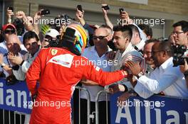 Fernando Alonso (ESP) Ferrari celebrates his third position in parc ferme with Anthony Hamilton (GBR). 18.11.2012. Formula 1 World Championship, Rd 19, United States Grand Prix, Austin, Texas, USA, Race Day.
