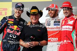 The podium (L to R): Sebastian Vettel (GER) Red Bull Racing, second; Mario Andretti (USA); Lewis Hamilton (GBR) McLaren, race winner; Fernando Alonso (ESP) Ferrari, third  18.11.2012. Formula 1 World Championship, Rd 19, United States Grand Prix, Austin, Texas, USA, Race Day.