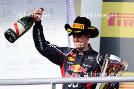 Sebastian Vettel (GER) Red Bull Racing celebrates his second position on the podium. 18.11.2012. Formula 1 World Championship, Rd 19, United States Grand Prix, Austin, Texas, USA, Race Day.