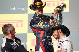 Race winner Lewis Hamilton (GBR) McLaren celebrates on the podium with Martin Whitmarsh (GBR) McLaren Chief Executive Officer and Sebastian Vettel (GER) Red Bull Racing. 18.11.2012. Formula 1 World Championship, Rd 19, United States Grand Prix, Austin, Texas, USA, Race Day.