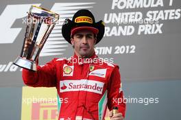 Fernando Alonso (ESP) Ferrari celebrates his third position on the podium. 18.11.2012. Formula 1 World Championship, Rd 19, United States Grand Prix, Austin, Texas, USA, Race Day.