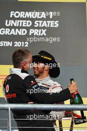 Race winner Lewis Hamilton (GBR) McLaren celebrates with Martin Whitmarsh (GBR) McLaren Chief Executive Officer on the podium. 18.11.2012. Formula 1 World Championship, Rd 19, United States Grand Prix, Austin, Texas, USA, Race Day.