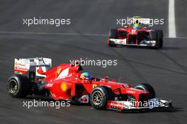Fernando Alonso (ESP) Ferrari F2012 leads team mate Felipe Massa (BRA) Ferrari F2012. 18.11.2012. Formula 1 World Championship, Rd 19, United States Grand Prix, Austin, Texas, USA, Race Day.