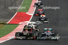 Romain Grosjean (FRA), Lotus F1 Team and Michael Schumacher (GER), Mercedes GP  18.11.2012. Formula 1 World Championship, Rd 19, United States Grand Prix, Austin, USA, Race Day
