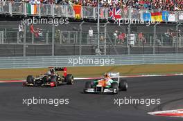(L to R): Kimi Raikkonen (FIN) Lotus F1 E20 and Nico Hulkenberg (GER) Sahara Force India F1 VJM05. 18.11.2012. Formula 1 World Championship, Rd 19, United States Grand Prix, Austin, Texas, USA, Race Day.