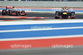 Sebastian Vettel (GER) Red Bull Racing RB8 leads Lewis Hamilton (GBR) McLaren MP4/27. 18.11.2012. Formula 1 World Championship, Rd 19, United States Grand Prix, Austin, Texas, USA, Race Day.
