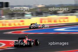 Lewis Hamilton (GBR) McLaren MP4/27 leads Charles Pic (FRA) Marussia F1 Team MR01. 17.11.2012. Formula 1 World Championship, Rd 19, United States Grand Prix, Austin, Texas, USA, Qualifying Day.