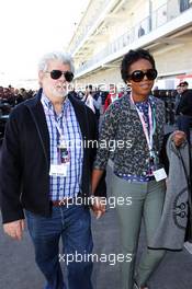 George Lucas (USA) Star Wars Creator with his partner Mellody Hobson (USA). 17.11.2012. Formula 1 World Championship, Rd 19, United States Grand Prix, Austin, Texas, USA, Qualifying Day.