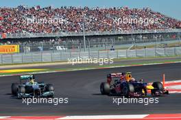 Mark Webber (AUS) Red Bull Racing RB8 and Nico Rosberg (GER) Mercedes AMG F1 W03. 17.11.2012. Formula 1 World Championship, Rd 19, United States Grand Prix, Austin, Texas, USA, Qualifying Day.