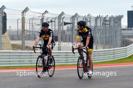 Martin Brundle (GBR) Sky Sports Commentator and Jenson Button (GBR) McLaren ride the circuit on their bikes. 15.11.2012. Formula 1 World Championship, Rd 19, United States Grand Prix, Austin, Texas, USA, Preparation Day.