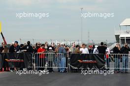Fans on a pit lane walkabout. 15.11.2012. Formula 1 World Championship, Rd 19, United States Grand Prix, Austin, Texas, USA, Preparation Day.