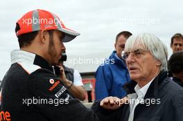(L to R): Lewis Hamilton (GBR) McLaren with Bernie Ecclestone (GBR) CEO Formula One Group (FOM). 15.11.2012. Formula 1 World Championship, Rd 19, United States Grand Prix, Austin, Texas, USA, Preparation Day.