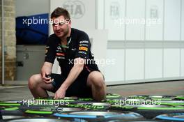 Red Bull Racing mechanic with Pirelli tyres. 15.11.2012. Formula 1 World Championship, Rd 19, United States Grand Prix, Austin, Texas, USA, Preparation Day.