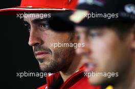 (L to R): Fernando Alonso (ESP) Ferrari and Sebastian Vettel (GER) Red Bull Racing in the FIA Press Conference. 15.11.2012. Formula 1 World Championship, Rd 19, United States Grand Prix, Austin, Texas, USA, Preparation Day.