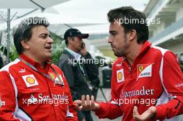 Fernando Alonso (ESP) Ferrari with Fabrizio Borra (ESP) Personal Trainer. 15.11.2012. Formula 1 World Championship, Rd 19, United States Grand Prix, Austin, Texas, USA, Preparation Day.