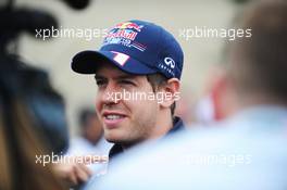 Sebastian Vettel (GER) Red Bull Racing with the media. 15.11.2012. Formula 1 World Championship, Rd 19, United States Grand Prix, Austin, Texas, USA, Preparation Day.