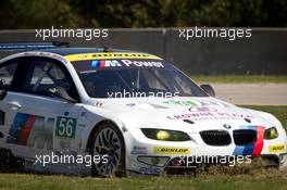 #56 BMW Team RLL E92 BMW M3: Dirk Muller, Uwe Alzen, Jonathan Summerton goes off-track 17-20.10.2012 Road Atlanta, USA. - Petit Le Mans, American Le Mans Series, Road Atlanta, USA