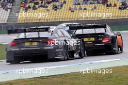 Joey Hand (USA) BMW Team RBM BMW M3 DTM and Robert Wickens (CAN) Mercedes AMG DTM-Team HWA DTM Mercedes AMG C-Coupé 20.10.2013, DTM Round 10, Hockenheim, Germany, Sunday.