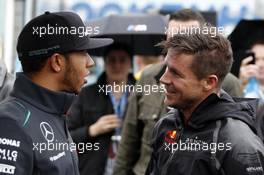 Lewis Hamilton (GBR) Mercedes AMG F1 and Felix Baumgartner (AUT) Red Bull Stratos 20.10.2013, DTM Round 10, Hockenheim, Germany, Sunday.