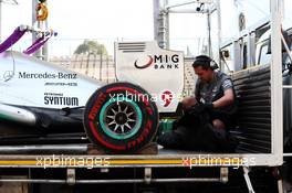 The Mercedes AMG F1 W04 of Lewis Hamilton (GBR) Mercedes AMG F1 is recovered back to the pits on the back of a truck. 15.03.2013. Formula 1 World Championship, Rd 1, Australian Grand Prix, Albert Park, Melbourne, Australia, Practice Day.