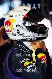 Sebastian Vettel (GER) Red Bull Racing with Red Bull Stratos themed helmet. 15.03.2013. Formula 1 World Championship, Rd 1, Australian Grand Prix, Albert Park, Melbourne, Australia, Practice Day.