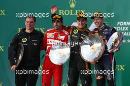 The podium (L to R): AAlan Permane (GBR) Lotus F1 Team Trackside Operations Director, Fernando Alonso (ESP) Ferrari, second; Kimi Raikkonen (FIN) Lotus F1 Team, race winner; Sebastian Vettel (GER) Red Bull Racing, third. 17.03.2013. Formula 1 World Championship, Rd 1, Australian Grand Prix, Albert Park, Melbourne, Australia, Race Day.