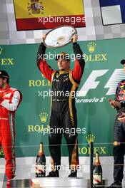 Race winner Kimi Raikkonen (FIN) Lotus F1 Team celebrates on the podium. 17.03.2013. Formula 1 World Championship, Rd 1, Australian Grand Prix, Albert Park, Melbourne, Australia, Race Day.