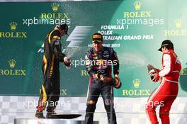 (L to R): Race winner Kimi Raikkonen (FIN) Lotus F1 Team celebrates with Sebastian Vettel (GER) Red Bull Racing and Fernando Alonso (ESP) Ferrari on the podium. 17.03.2013. Formula 1 World Championship, Rd 1, Australian Grand Prix, Albert Park, Melbourne, Australia, Race Day.