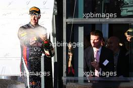 Sebastian Vettel (GER) Red Bull Racing celebrates his third position on the podium. 17.03.2013. Formula 1 World Championship, Rd 1, Australian Grand Prix, Albert Park, Melbourne, Australia, Race Day.