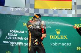Race winner Kimi Raikkonen (FIN) Lotus F1 Team celebrates on the podium. 17.03.2013. Formula 1 World Championship, Rd 1, Australian Grand Prix, Albert Park, Melbourne, Australia, Race Day.