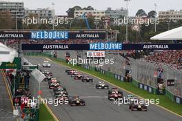 Sebastian Vettel (GER) Red Bull Racing leads at the start of the race. 17.03.2013. Formula 1 World Championship, Rd 1, Australian Grand Prix, Albert Park, Melbourne, Australia, Race Day.