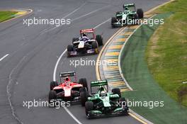 Giedo van der Garde (NLD) Caterham CT03 leads Jules Bianchi (FRA) Marussia F1 Team MR02. 17.03.2013. Formula 1 World Championship, Rd 1, Australian Grand Prix, Albert Park, Melbourne, Australia, Race Day.