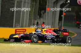 Sergio Perez (MEX) McLaren MP4-28 and Sebastian Vettel (GER) Red Bull Racing RB9 battle for position. 17.03.2013. Formula 1 World Championship, Rd 1, Australian Grand Prix, Albert Park, Melbourne, Australia, Race Day.