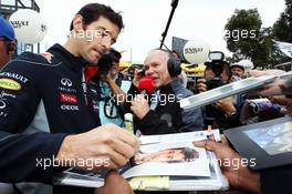 Mark Webber (AUS) Red Bull Racing signs autographs for the fans. 16.03.2013. Formula 1 World Championship, Rd 1, Australian Grand Prix, Albert Park, Melbourne, Australia, Qualifying Day.