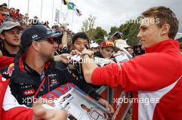 Max Chilton (GBR) Marussia F1 Team signs autographs for the fans. 16.03.2013. Formula 1 World Championship, Rd 1, Australian Grand Prix, Albert Park, Melbourne, Australia, Qualifying Day.