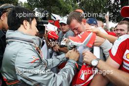 Sergio Perez (MEX) McLaren signs autographs for the fans. 16.03.2013. Formula 1 World Championship, Rd 1, Australian Grand Prix, Albert Park, Melbourne, Australia, Qualifying Day.