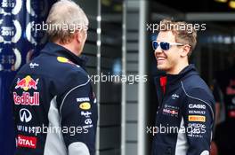 (L to R): Dr Helmut Marko (AUT) Red Bull Motorsport Consultant with Sebastian Vettel (GER) Red Bull Racing. 16.03.2013. Formula 1 World Championship, Rd 1, Australian Grand Prix, Albert Park, Melbourne, Australia, Qualifying Day.