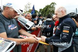 Adrian Newey (GBR) Red Bull Racing Chief Technical Officer signs autographs for the fans. 16.03.2013. Formula 1 World Championship, Rd 1, Australian Grand Prix, Albert Park, Melbourne, Australia, Qualifying Day.