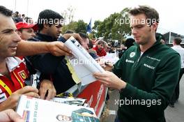 Giedo van der Garde (NLD) Caterham F1 Team signs autographs for the fans. 16.03.2013. Formula 1 World Championship, Rd 1, Australian Grand Prix, Albert Park, Melbourne, Australia, Qualifying Day.